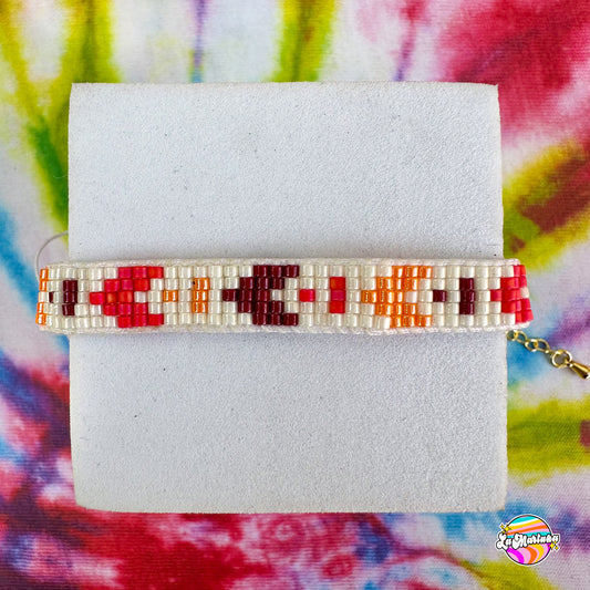 Pulsera tejida Loom flechita